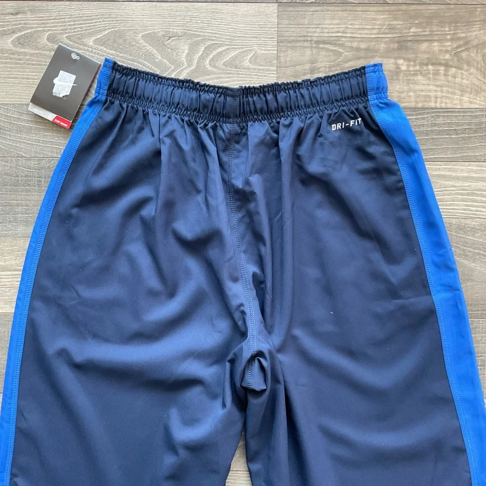 NWT Nike Team Woven Dri Fit Training Pants Men’s MEDIUM Blue Cord Hem 377786-451